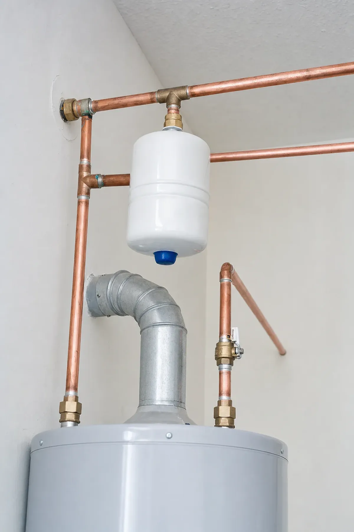 Expansion tank installed on the cold line above a water heater in Orange County